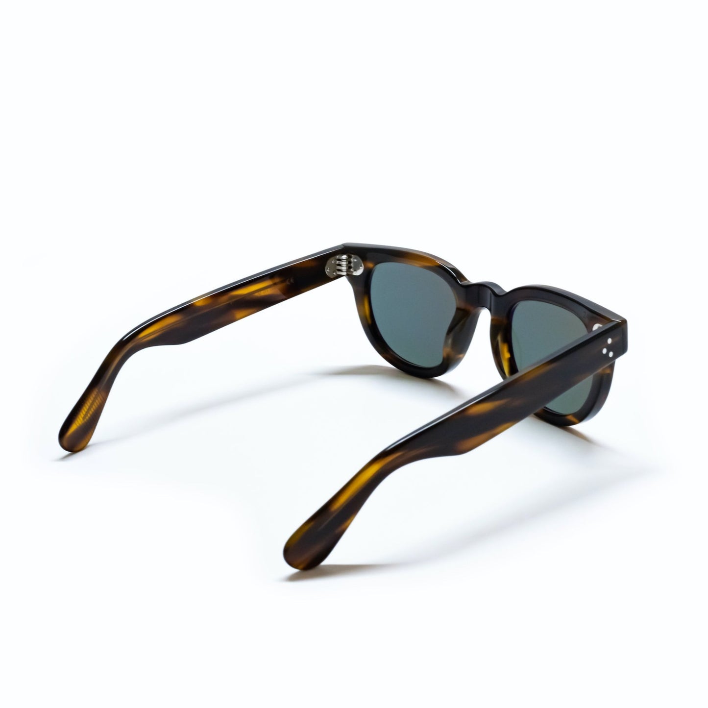 A back view of the FDR Sunglasses frame. It's the Demi Amber variant.