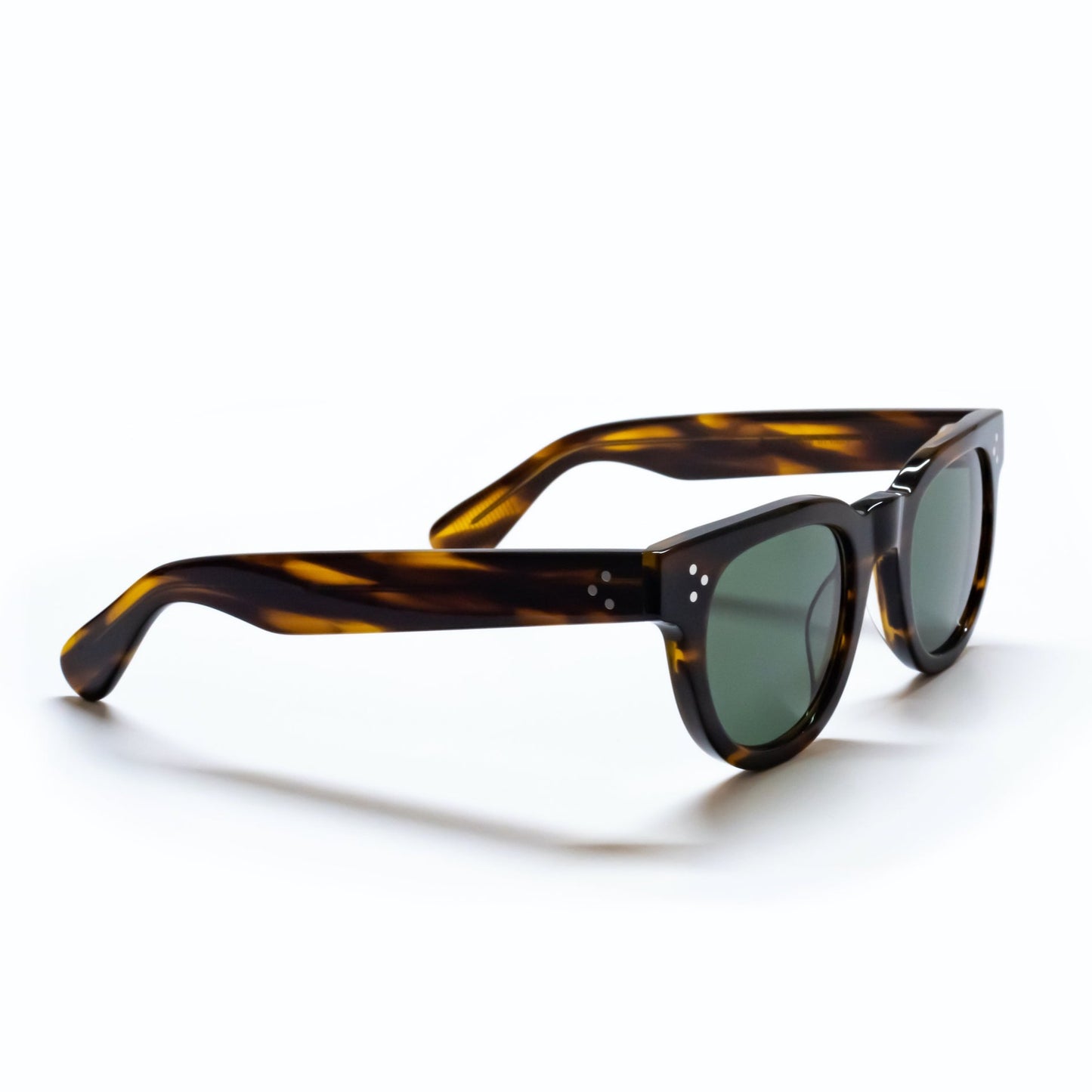A side view of the FDR Sunglasses frame. It's the Demi Amber variant.