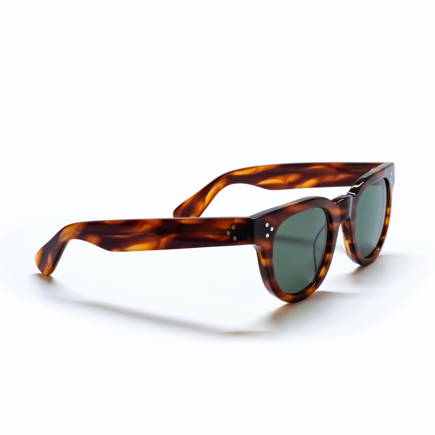 A side view of the FDR Sunglasses frame. It's the Havana Sunrise variant. 