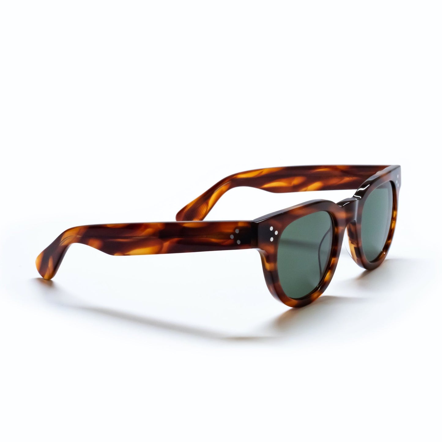A side view of the FDR Sunglasses frame. It's the Havana Sunrise variant.