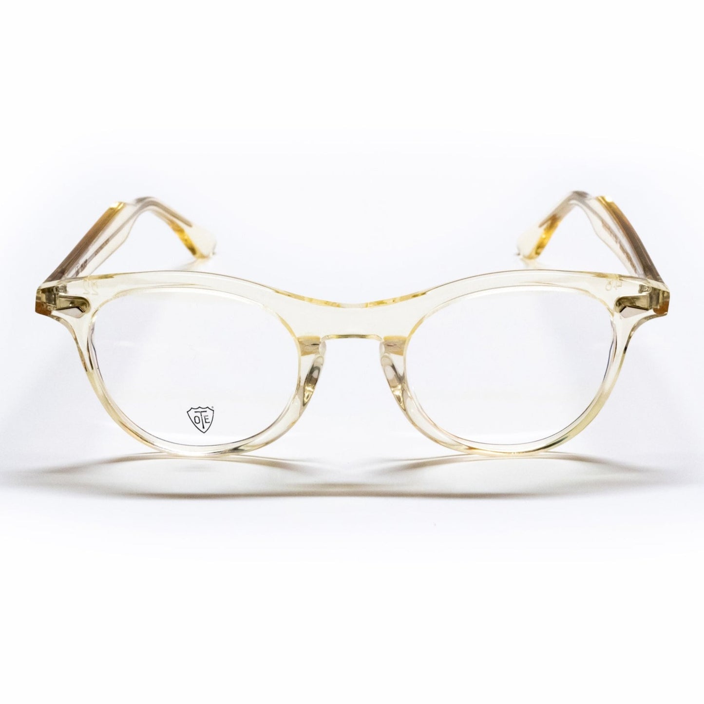 A front view of the champaign Leading Liz low bridge fit frame, the luxury cat-eye fashion glasses.
