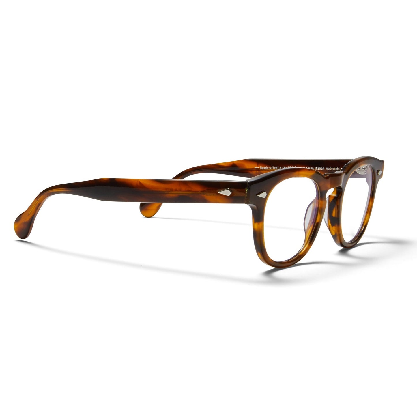 A side view of the demi amber Arnel USA frame—the Vintage eyewear.