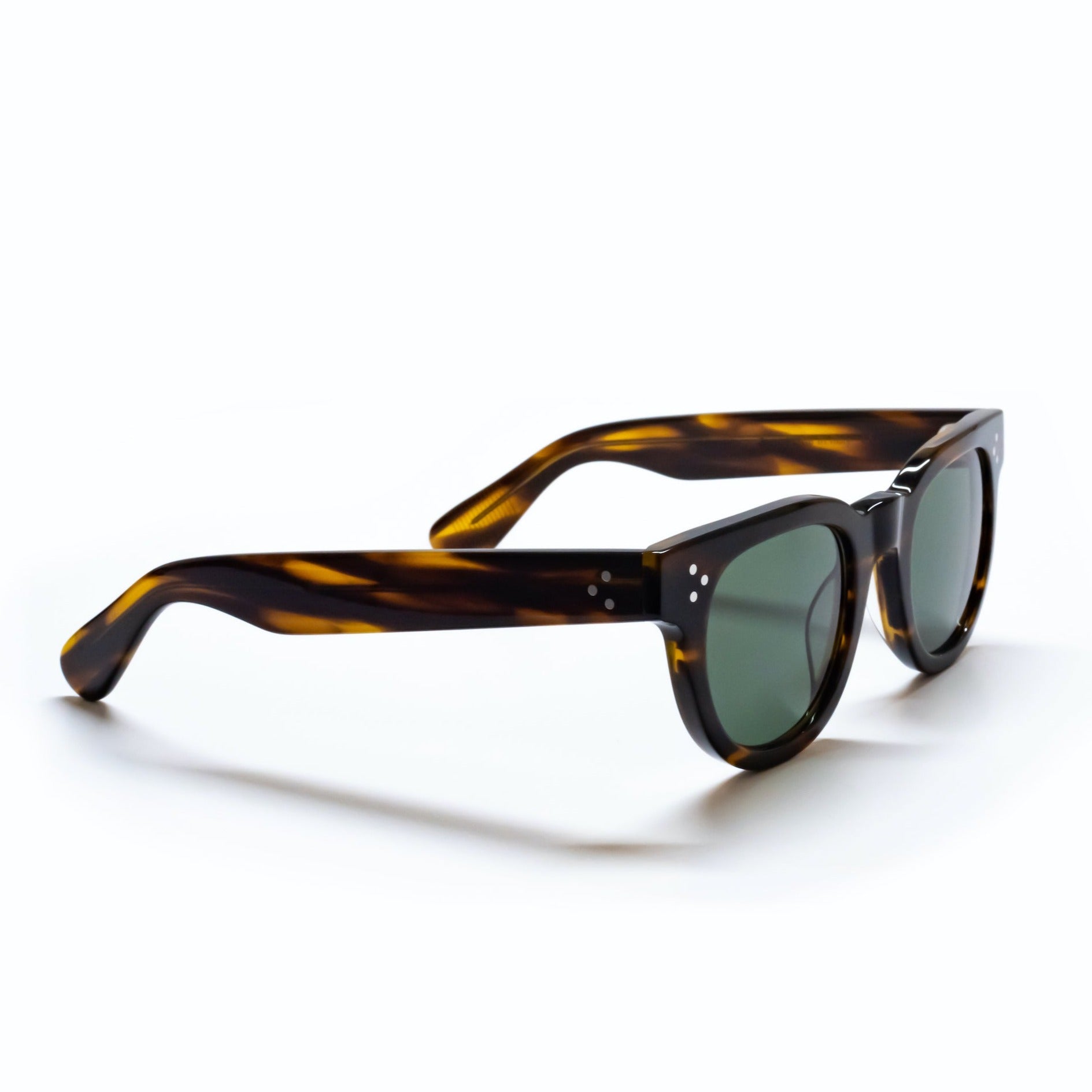 A side view of the FDR Sunglasses frame. It's the Demi Amber variant. 