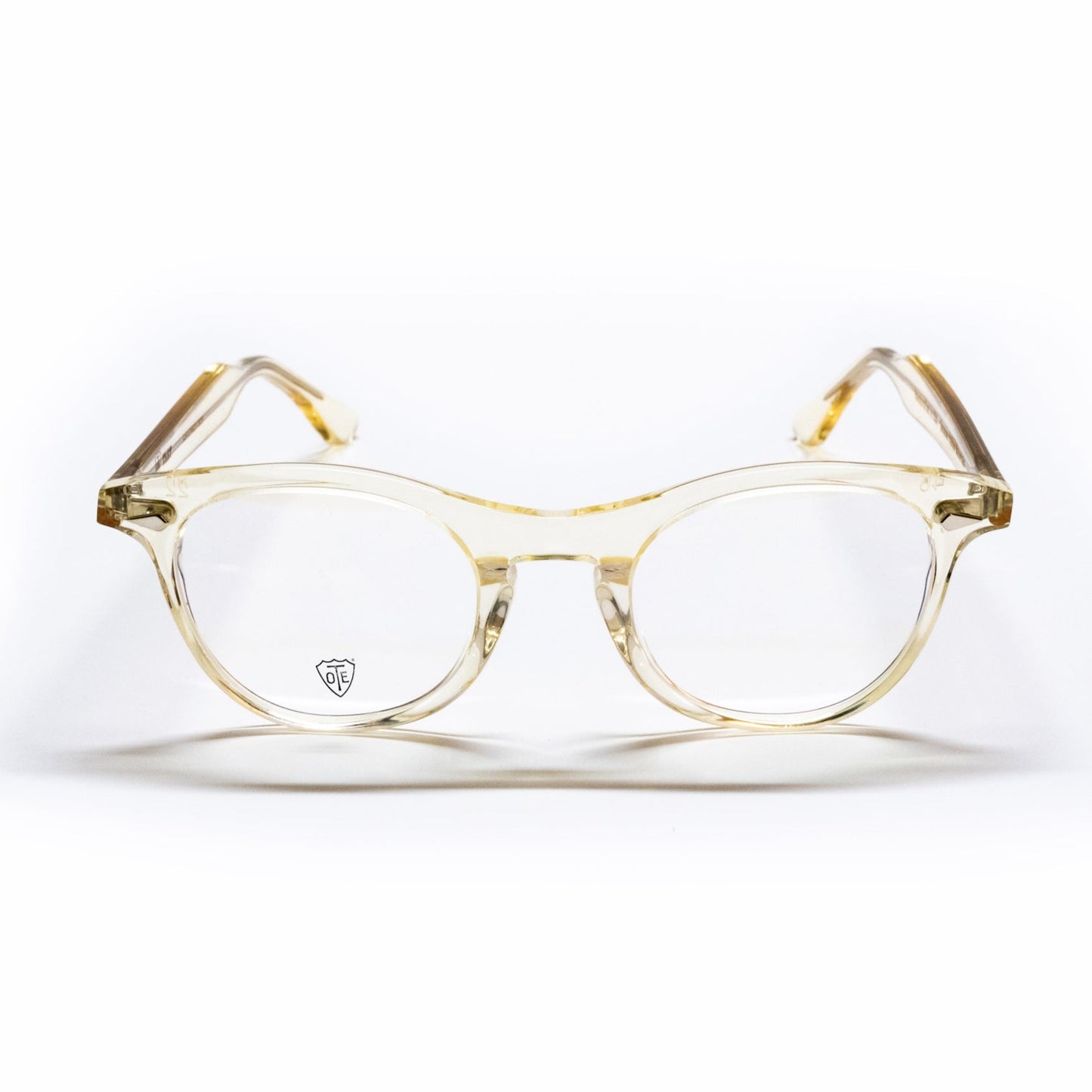 A front view of the champaign Leading Liz frame, the luxury cat-eye fashion glasses.