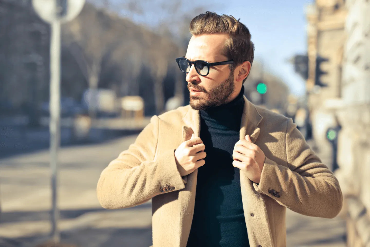 A person on a sidewalk busy showing off their Tart Optical classic eyeglass frames. 